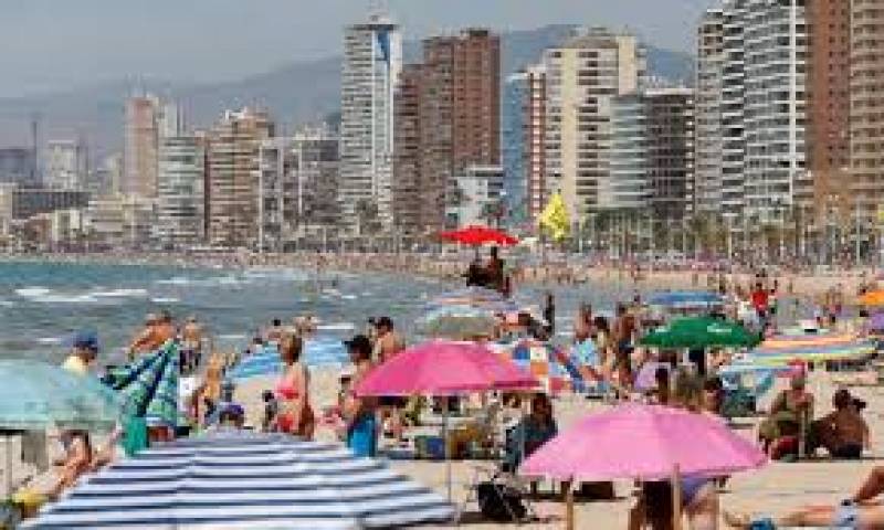 <span style='color:#780948'>ARCHIVED</span> - Flip-flops a must: Beachgoers in Benidorm warned not to go barefoot due to poor state of decking