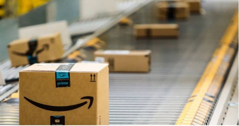<span style='color:#780948'>ARCHIVED</span> - Amazon pauses expansion in Spain as bottom falls out of online shopping market