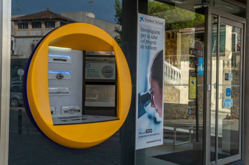 <span style='color:#780948'>ARCHIVED</span> - CaixaBank customers in Spain hit with new charges for ATM withdrawals