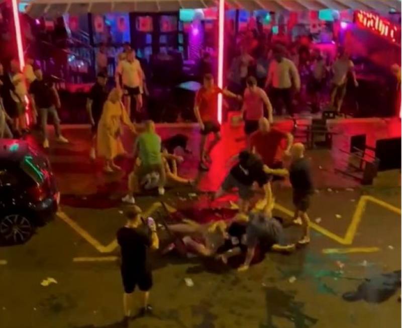 <span style='color:#780948'>ARCHIVED</span> - WATCH: Massive World Cup street brawl between Wales and England fans in Tenerife