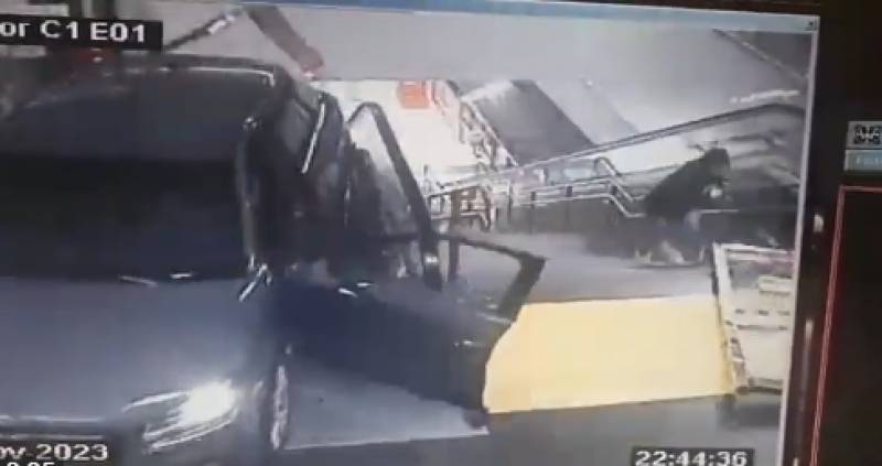 WATCH VIDEO: Car crashes down Madrid metro escalator and almost takes a young man with it