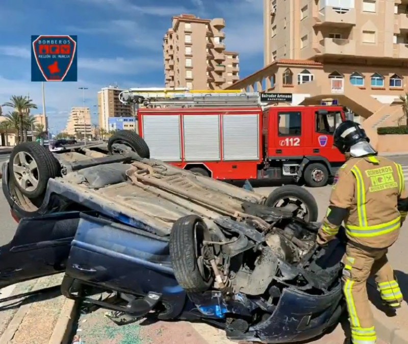 <span style='color:#780948'>ARCHIVED</span> - Car overturns on the Gran Via of la Manga del Mar Menor