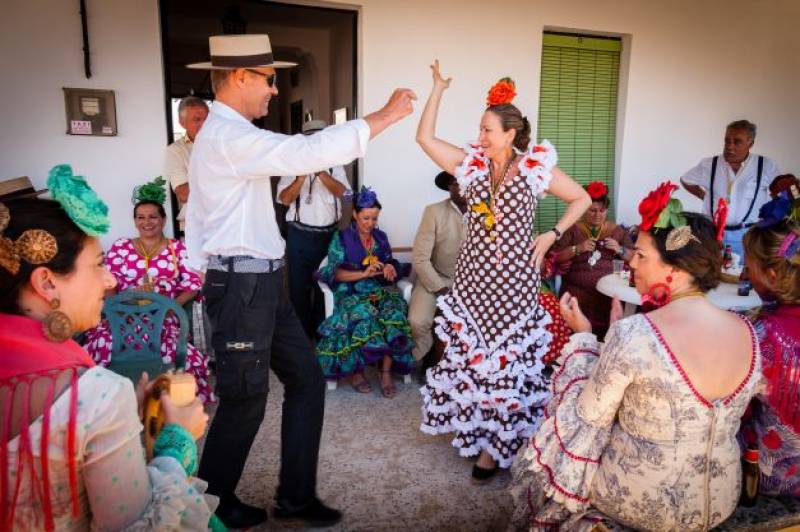 <span style='color:#780948'>ARCHIVED</span> - The Feria de Abril festival in Seville: why is the April fiesta in May this year?