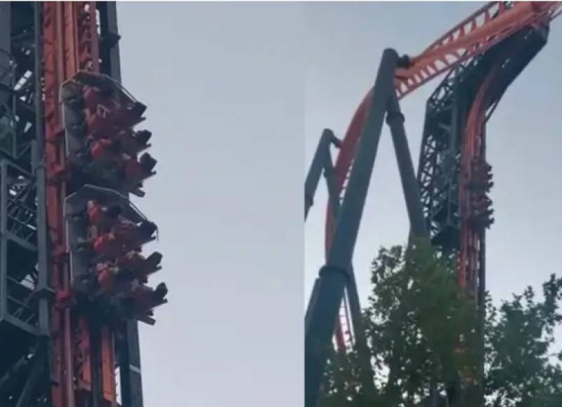 <span style='color:#780948'>ARCHIVED</span> - Passengers trapped upside down as Madrid roller coaster stops in its tracks