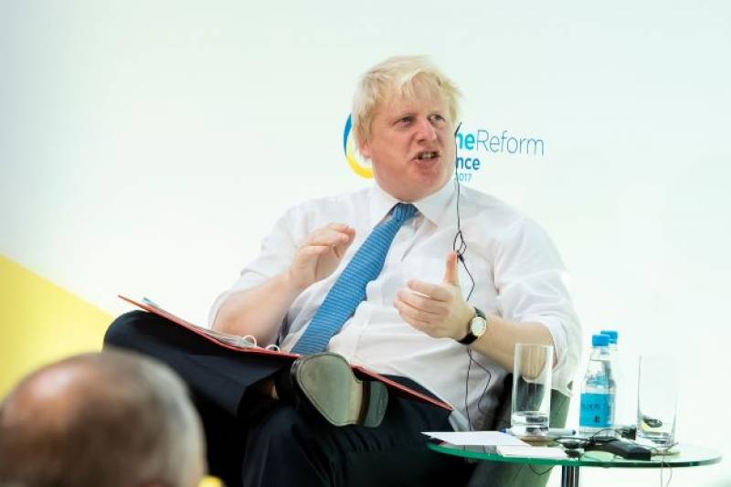 <span style='color:#780948'>ARCHIVED</span> - Boris Johnson enjoys beach holiday in Spain while UK economy divebombs
