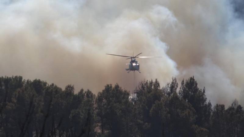 <span style='color:#780948'>ARCHIVED</span> - Spanish forest fire rages on, but the outlook is encouraging
